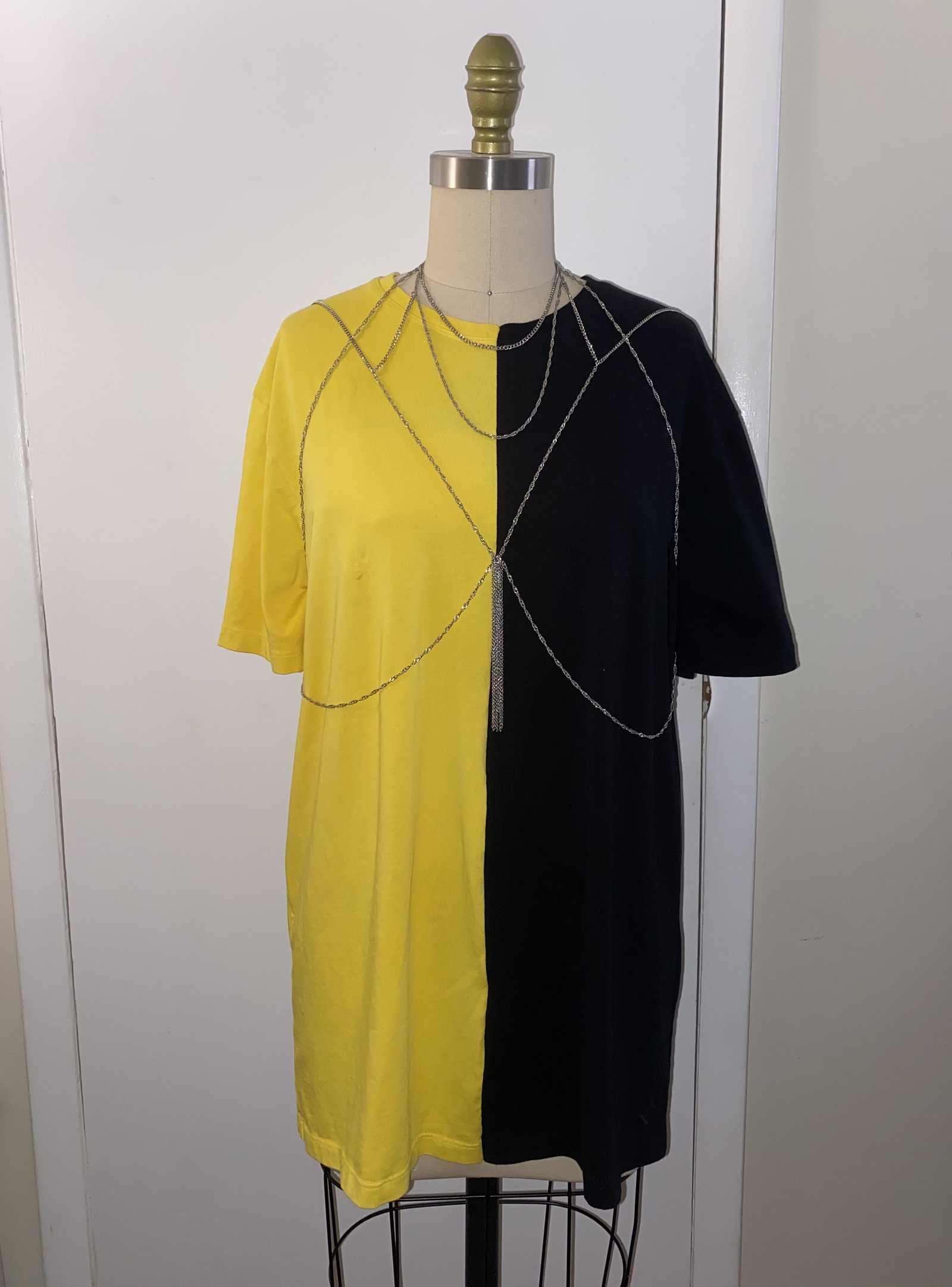 Half-yellow half-black T-shirt dress with sterling chain harness