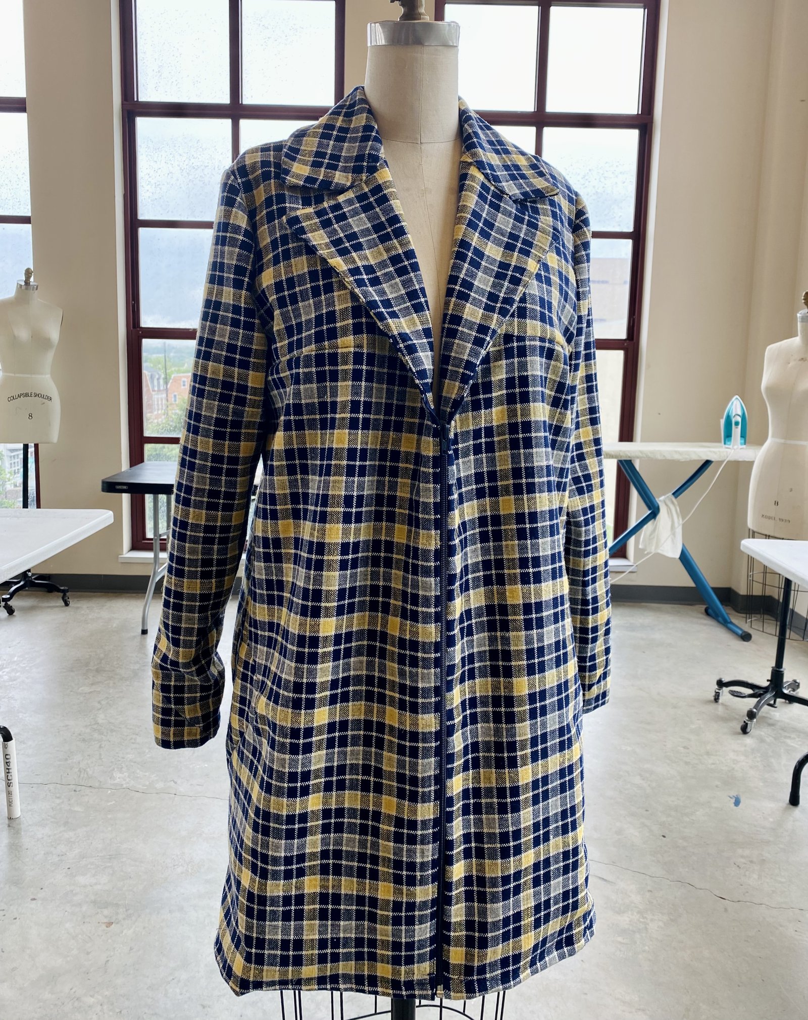 Navy and yellow plaid trench coat, full canvas notch lapel construction on dress form