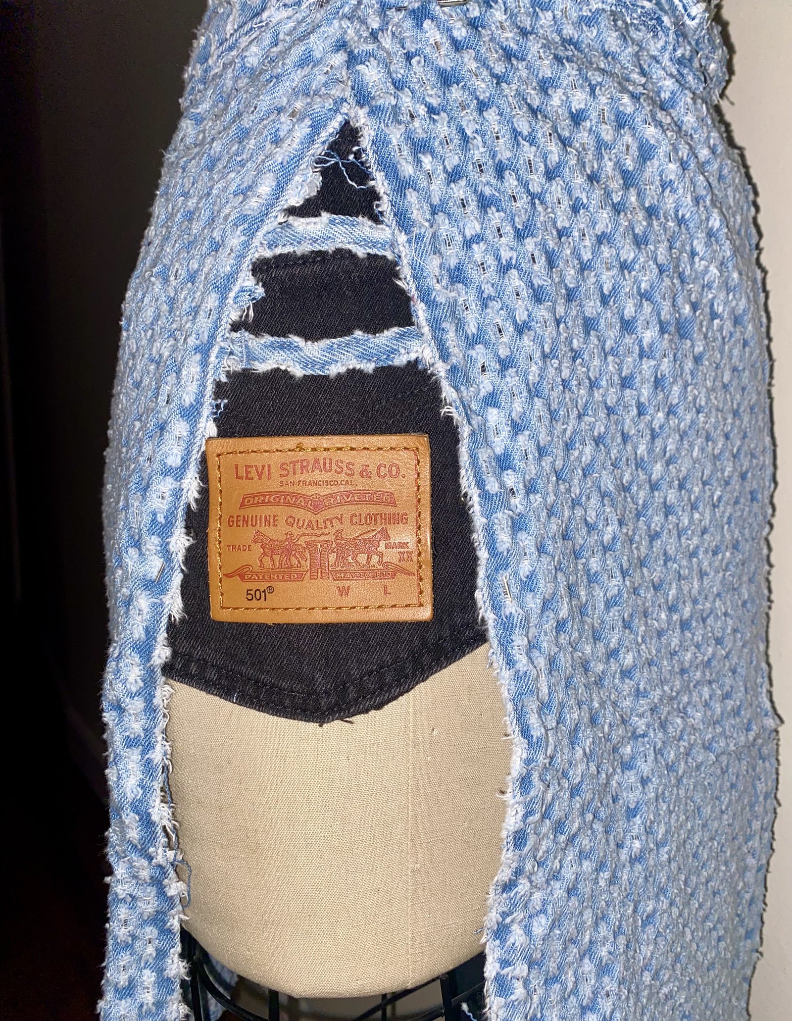Levi's leather tag preserved as a feature on the back of a reworked denim skirt